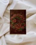 Original oil painting, unframed. Deep and rich velvetty red roses with hints of green leaves surrounding on a deep red background. Moody, romantic, cottagecore style painting.